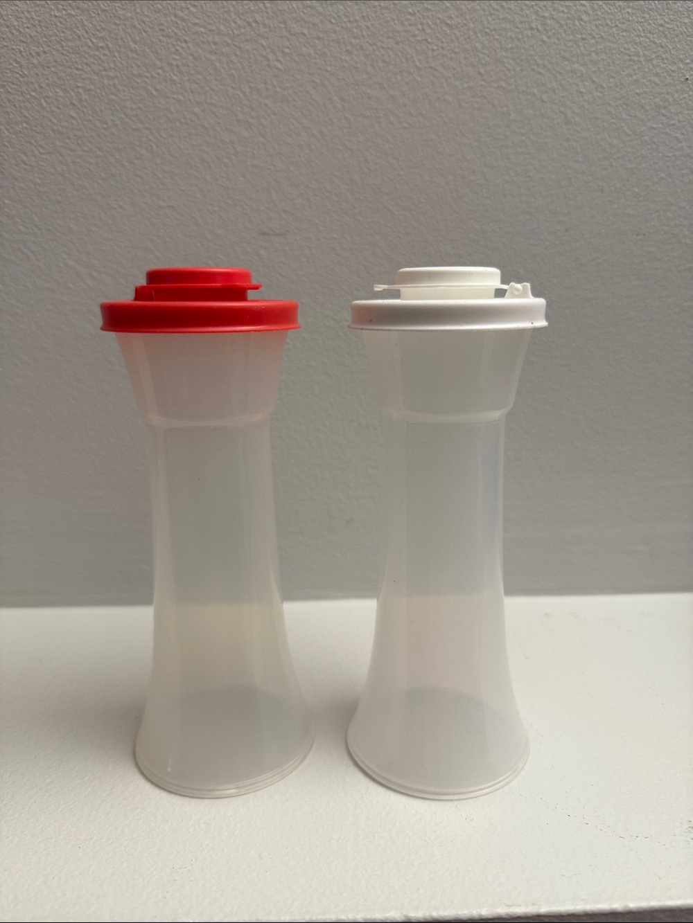 Tupperware hourglass salt and pepper shakers